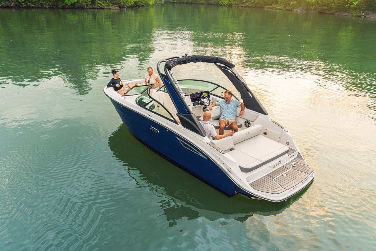 Friends preparing for a day on the water aboard an SDX 230